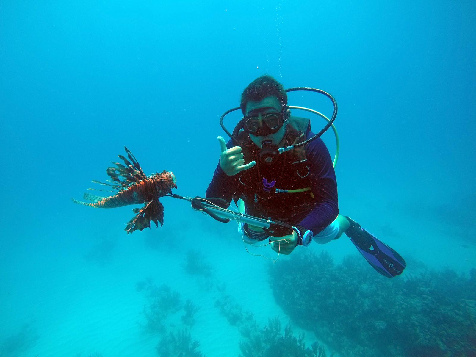 John Reinbott diving for Lion Fish