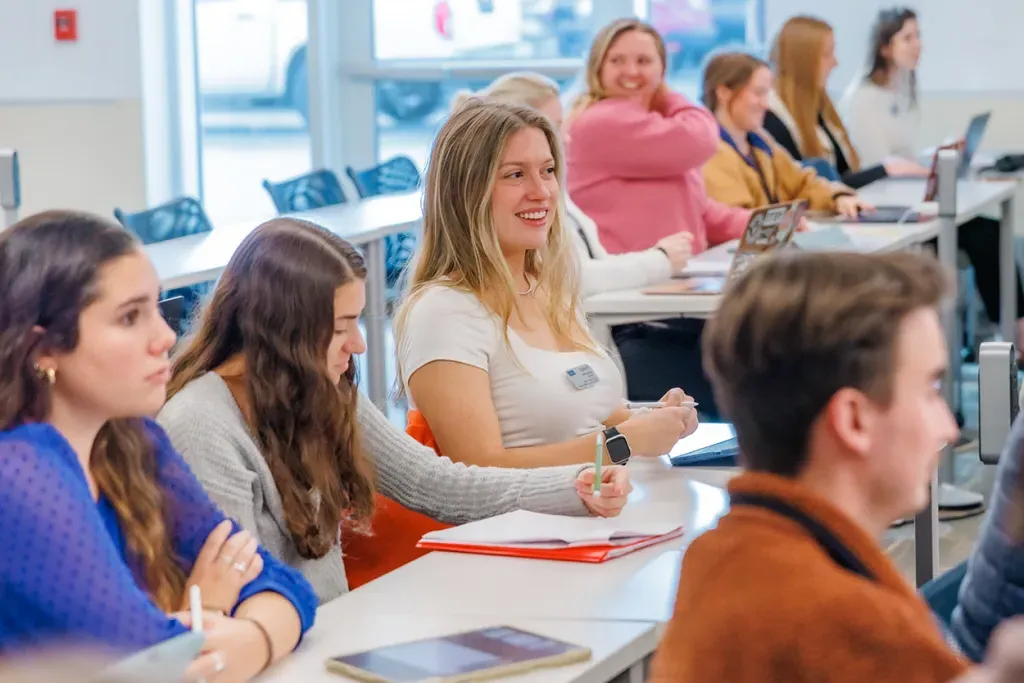 A class of physical therapy students listening to a lecture