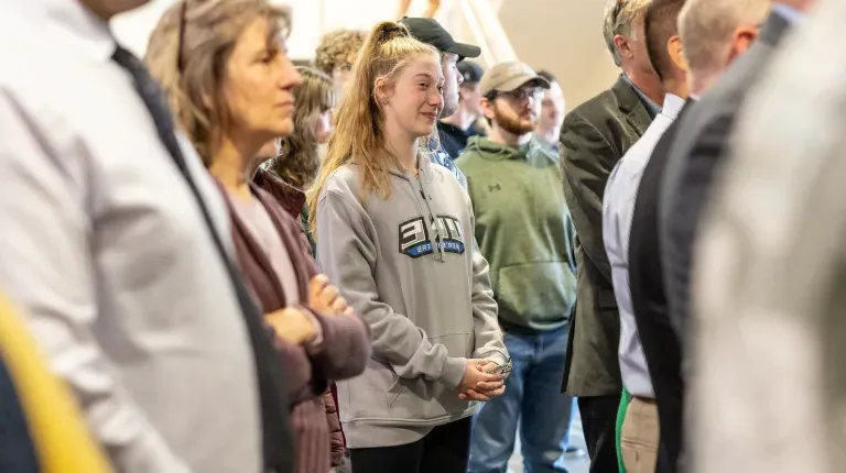 An audience watches speeches