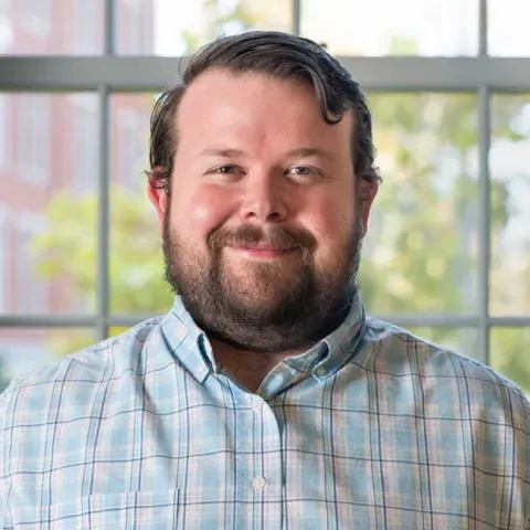 Headshot of Josh Mangin